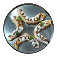 La Competencia Bastoni Dulce: 4 piezas de masa de pizza rellenas de nutella y nueces 